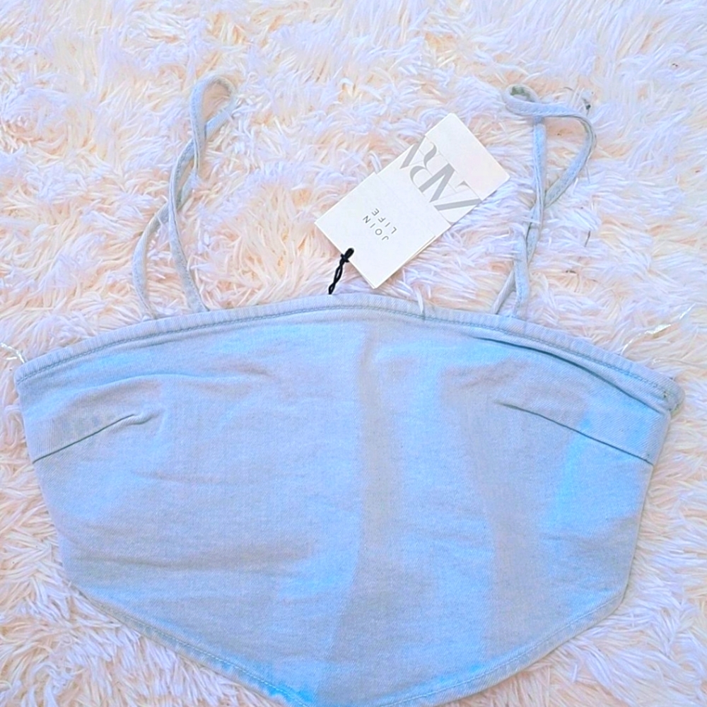 Brand new light washed Zara denim crop top in a size small, US 4.